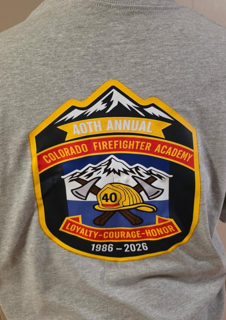 Finished gray Colorado Firefighter Academy shirt with a full-color 40th Annual commemorative back design