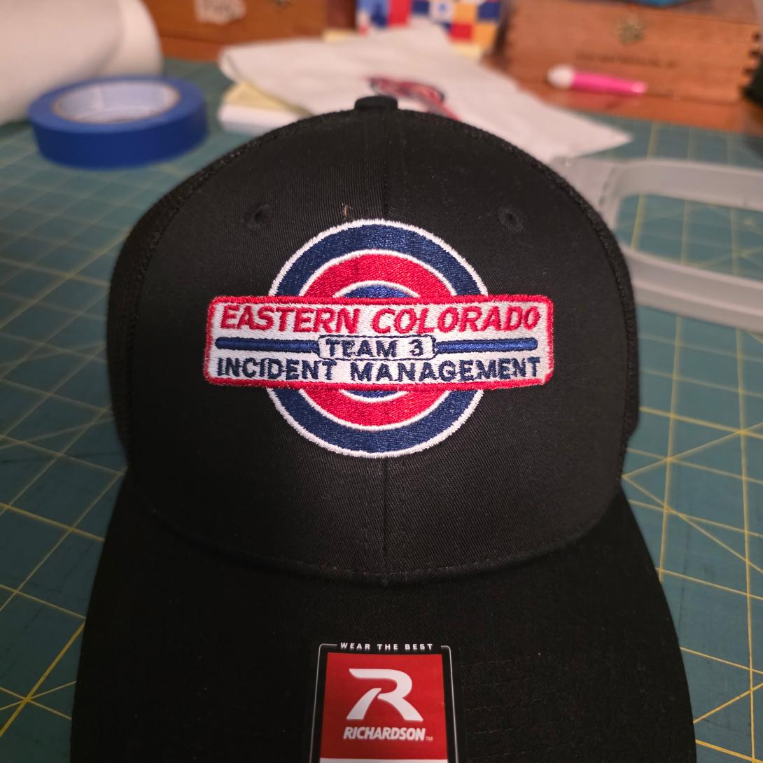 Completed black cap with Eastern Colorado Incident Management Team embroidery