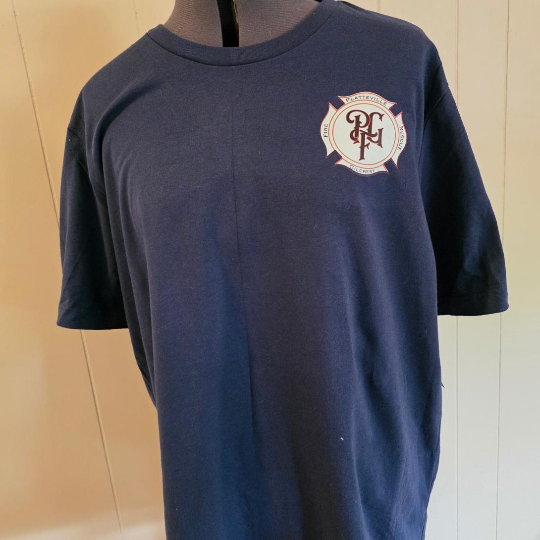 Completed navy public-safety shirt with a clean left-chest department emblem